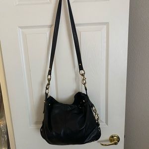 Black leather Rebecca Minkoff shoulder bag.